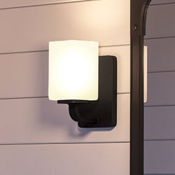 An UHP4328 Contemporary Wall Sconce 8.5''H x 4.75''W, Midnight Black Finish, Louisville Collection with a glass shade by Urban Ambiance - luxury