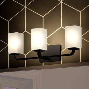 Three unique and luxury UHP4330 Contemporary Bath Light 8.5''H x 23.5''W fixtures in a bathroom with a gorgeous geometric pattern on the wall, manufactured by Urban