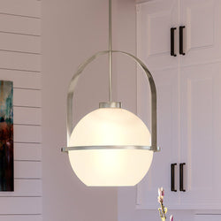 A modern kitchen with a luxurious UHP4341 Mid-Century Modern Pendant 21.625''H x 16.125''W, Brushed Nickel Finish, Albuquerque Collection pendant light from