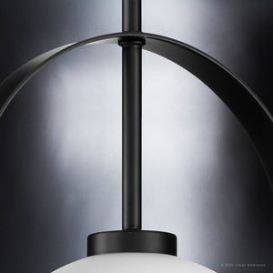 A unique lighting fixture, the UHP4344 is a Mid-Century Modern pendant with a white glass globe.