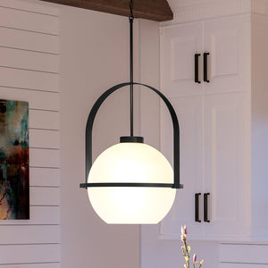 A unique pendant light hangs over a kitchen table, adding a touch of luxury to the urban ambiance.