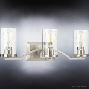 Three beautiful UHP4362 Contemporary Bath Lights 8''H x 24''W, Brushed Nickel Finish, Mesa Collection by Urban Ambiance with clear glass bulbs.