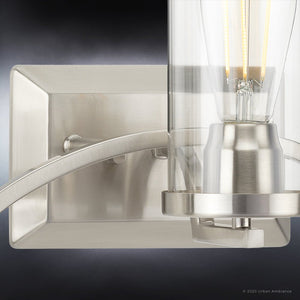 A luxurious Urban Ambiance UPH4362 Contemporary Bath Light 8''H x 24''W, Brushed Nickel Finish, Mesa Collection wall sconce with a clear glass shade.