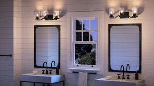 A unique bathroom with two UHP4363 Contemporary Bath Light 8''H x 24''W, Midnight Black Finish, Mesa Collection sinks and a window.