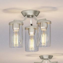 A beautiful UHP4366 Contemporary Ceiling Light 10.5''H x 13''W, Brushed Nickel Finish, Mesa Collection ceiling fixture with three glass cylinders by Urban Ambiance.