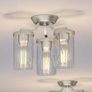 A beautiful UHP4366 Contemporary Ceiling Light 10.5''H x 13''W, Brushed Nickel Finish, Mesa Collection ceiling fixture with three glass cylinders by Urban Ambiance.