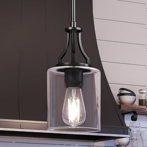 An Urban Ambiance UHP4373 Contemporary Pendant lighting fixture, Midnight Black Finish, Mesa Collection hanging over a kitchen counter.