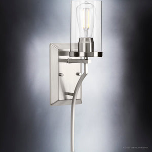 A beautiful Urban Ambiance UHP4376 Contemporary Wall Sconce, a lighting fixture with a brushed nickel finish and clear glass shade from the Mesa Collection.