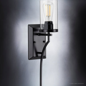 A stunning Midnight Black Finish wall sconce with a clear glass shade from Urban Ambiance.