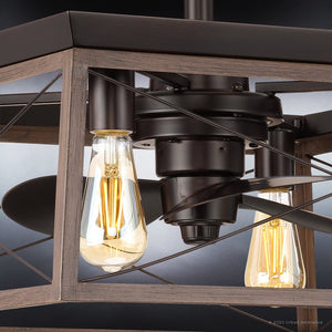 A gorgeous lighting fixture, the UHP9240 Farmhouse Ceiling Fan features an Olde Bronze Finish and two light bulbs hanging from it.