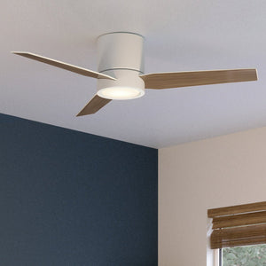 An Urban Ambiance UHP9291 Mid-Century-Modern Ceiling Fan 9.75''H x 44''W, Matte White Finish, Camden Collection in a beautiful bedroom with blue