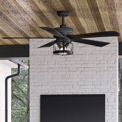 This luxurious UHP9302 Coastal Ceiling Fan with an Olde Iron Finish from the Cairns Collection enhances the gorgeous living room with a TV.