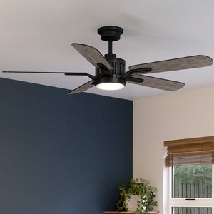 A beautiful Urban Ambiance UHP9312 Traditional Ceiling Fan from the unique Launceston Collection, featuring an oil rubbed bronze finish, in a room with blue walls.