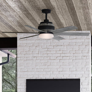 A living room with a UHP9333 Transitional Ceiling Fan 17.25''H x 56''W, Charcoal Finish, Melton Collection from Urban Ambiance, a fireplace, and