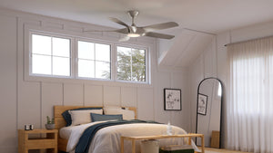 A bedroom with a beautiful Urban Ambiance UHP9371 Transitional Ceiling Fan 14.25''H x 60''W, Hand-Painted Silver Finish from the Albany Collection.