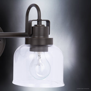 A beautiful ULB2030 Modern Farmhouse Bath Lamp from Urban Ambiance with a clear glass bulb.