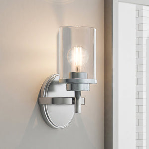 A beautiful and unique ULB2043 New-Traditional Wall Sconce with a glass shade.