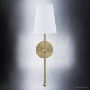 A unique wall sconce with a white shade from Urban Ambiance.