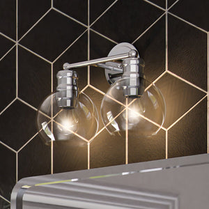 A beautiful black and white bathroom with two unique ULB2081 Industrial Bath Lights.