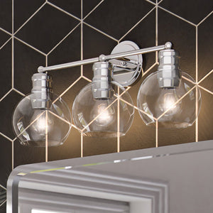 A bathroom with three gorgeous Urban Ambiance ULB2083 Industrial Bath Lights, 10''H x 24''W, Polished Chrome Finish, Nipsa Collection fixtures above a mirror.