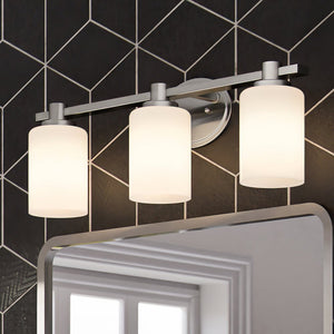 A bathroom with a gorgeous ULB2103 New-Traditional Bath Light, 8''H x 23''W, Brushed Nickel Finish, Predava Collection by Urban Ambiance tiled