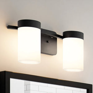 Two gorgeous ULB2150 luxury bath lights, 7''H x 15''W, Matte Black Finish, Cashel Collection by Urban Ambiance hanging on a wall above a mirror