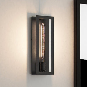 A beautiful Urban Ambiance ULB2170 Transitional Wall Sconce with a black frame and a luxury light bulb.