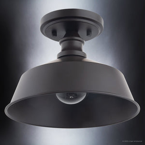 A unique ULB2200 Modern Farmhouse lamp with a glass shade.