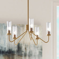 A gorgeous ULB2220 Transitional Chandelier lighting fixture from Urban Ambiance accents a room with a painting on the wall.