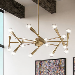 A gorgeous Mid-Century Modern chandelier from the Inverness Collection, in a brushed brass finish, adds a unique touch of luxury to the living room.