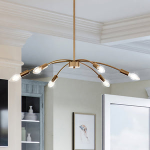 A ULB2270 Modern Chandelier, 7''H x 27''W lighting fixture from the Castletown Collection by Urban Ambiance hanging over a dining room table.