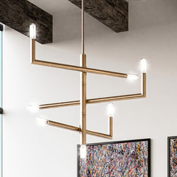 A unique ULB2281 Modern Chandelier, 23''H x 27''W, Brushed Brass Finish from the Lorient Collection by Urban Ambiance enhances the gorgeous living room with a