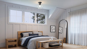 A unique ULB2300 Modern Farmhouse ceiling lamp illuminates the bedroom, complementing the bed, dresser and mirror from the Onchan Collection by Urban Ambiance.