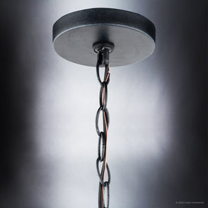 A unique pendant light with a chain hanging from it.