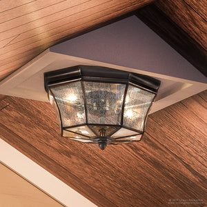 A unique Urban Ambiance UQL1155 Colonial Outdoor Ceiling Light, 8"H x 15.25"W, Black Silk Finish from the Cambridge Collection hanging on the ceiling of a room