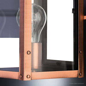 Close-up of the UQL1413 Vintage Outdoor Wall Light from Urban Ambiance’s Longview Collection, featuring a rectangular, rustic copper-finished frame and clear glass panels against a white background—an elegant example of handcrafted outdoor lighting.