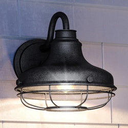 A beautiful and unique lighting fixture, the Urban Ambiance UQL1572 Nautical Outdoor Wall Sconce 12.5''H x 12''W with a Seasoned Iron Finish is