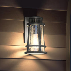 A beautiful lighting fixture, the Urban Ambiance UQL1581 Tudor Outdoor Wall Sconce 9.5''H x 5.75''W, Natural Black Finish from the West