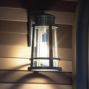 An Urban Ambiance lighting fixture, the UQL1583 Tudor Outdoor Wall Sconce 16.25''H x 9.75''W, presents a beautiful and gorgeous Natural Black