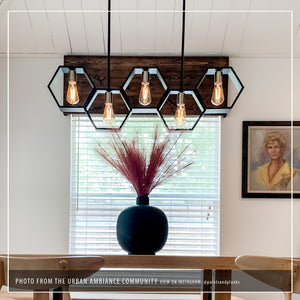 A dining room with a unique Urban Ambiance UQL2771 Industrial Chandelier, 13