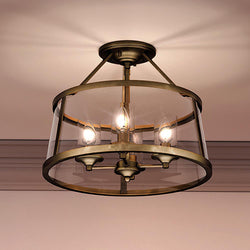A unique Urban Ambiance ceiling light fixture with three UQL3650 Guildford Collection lights in a gorgeous Rustic Brass finish.