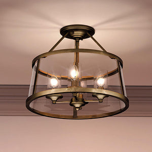 A unique Urban Ambiance ceiling light fixture with three UQL3650 Guildford Collection lights in a gorgeous Rustic Brass finish.