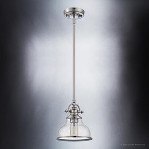 A unique and luxury Urban Ambiance lamp fixture with a UQL3661 Traditional Pendant 9.5''H x 8''W, Brushed Nickel Finish, Pasadena Collection clear glass shade.