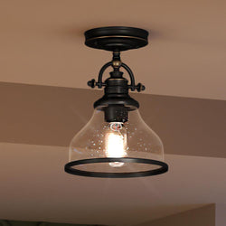 An Urban Ambiance UQL3662 Traditional Ceiling light with a beautiful glass shade.