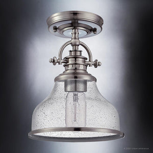 An Urban Ambiance UQL3663 Traditional Ceiling 10.5''H x 8''W, Brushed Nickel Finish, Pasadena Collection luxury light fixture with a clear glass shade.