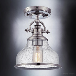 A beautiful Urban Ambiance UQL3663 Pasadena Collection light fixture with a clear glass shade.