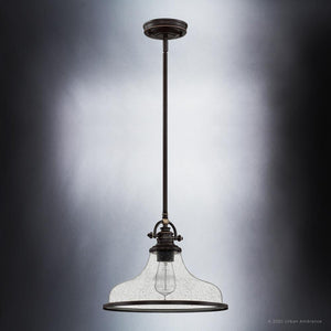 A unique Urban Ambiance UQL3664 Traditional Pendant 10.75''H x 13.5''W light fixture with a clear glass shade.