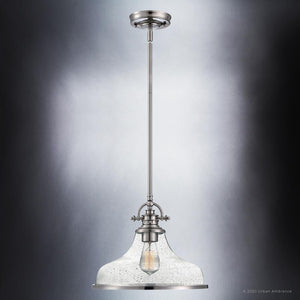 A beautiful lighting fixture from the Pasadena Collection, featuring a glass shade and brushed nickel finish.