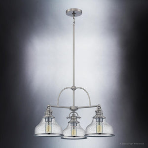 Three beautiful UQL3667 Traditional Chandelier 15.5''H x 24''W, Brushed Nickel Finish, Pasadena Collection lighting fixtures with clear glass shades are available from Urban Ambiance