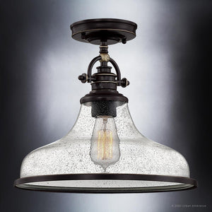 A beautiful UQL3668 lamp with a glass shade.